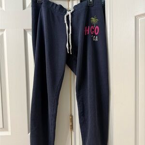 Hollister Navy Track Pants with Pink and Yellow Logo